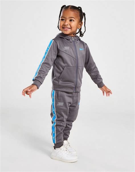 fake nike tracksuit|nike tape poly tracksuit.